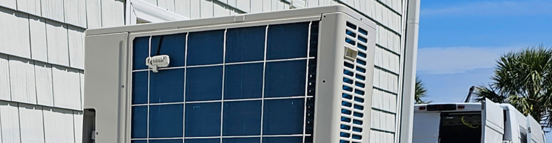 A close-up of a blue HVAC machine during maintenance in Georgetown